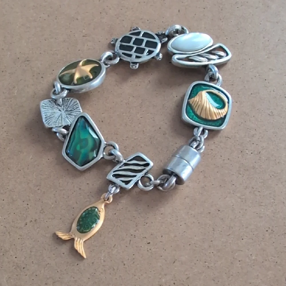 Artisan Silver and Gold Charm Bracelet